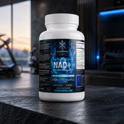 Atom Vortex NAD+ supplement bottle on dark tabletop, front label facing camera